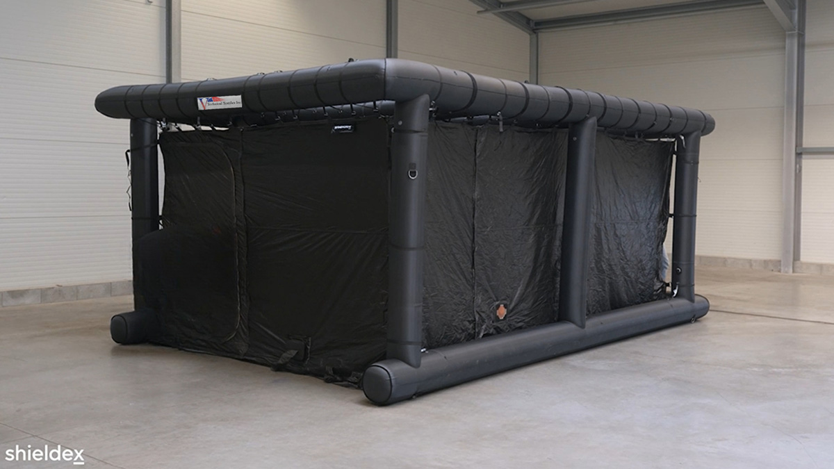 8000T series RF shielded enclosure with inflatable frame and divided antechamber for power cable management.